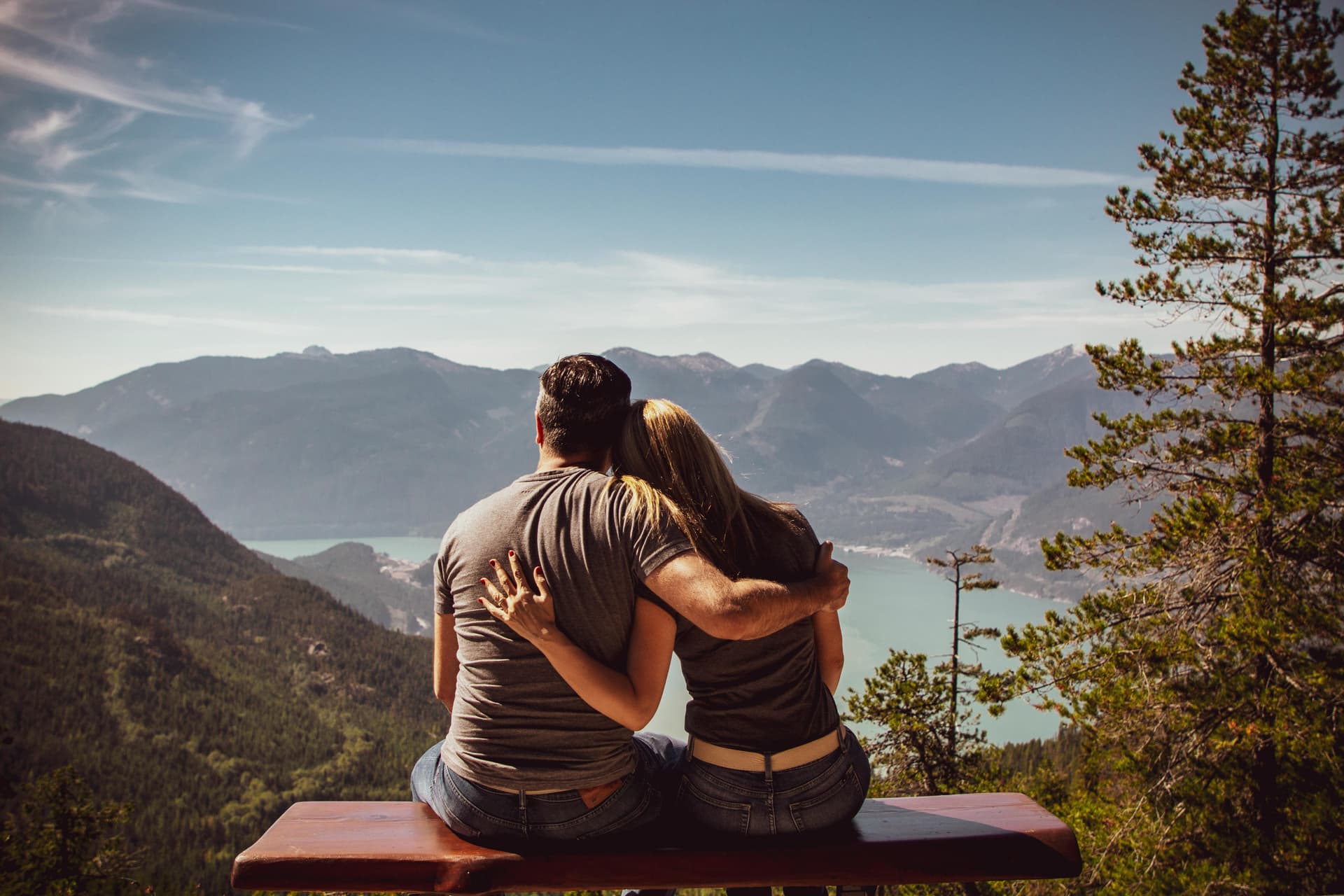 Couple talking on a park bench